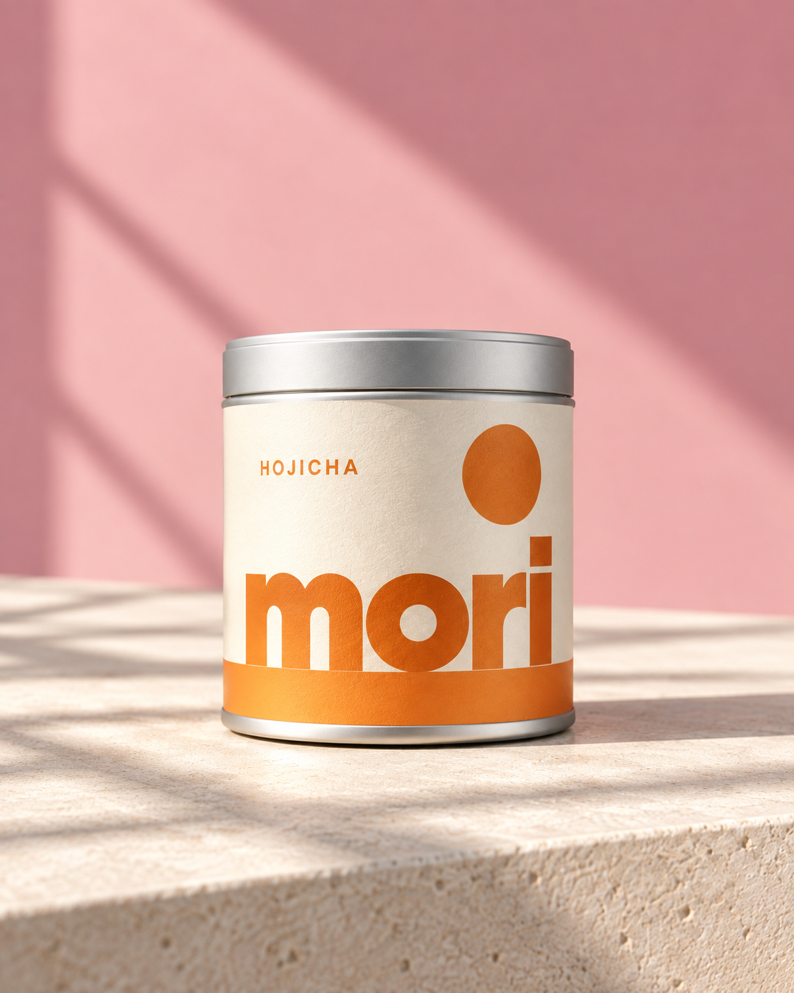 Mori Hojicha in a white tin with orange accents