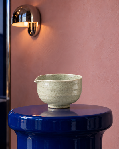 Green speckled matcha bowl with pouring spout